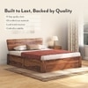 Marieta Solid Wood Queen Size Hydraulic Storage Bed In Teak Finish
