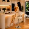 Doe Buck Adjustable Upholstered Bar Stool in Beige Colour with Chrome Base
