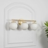 Hollis 3 Light Bathroom Wall Light with Opal Glass In Brass Finish
