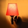 Devansh Metal Electric Wall Light in Gold Colour with Orange Shade Count of 1 Light