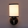Devansh Metal Electric Wall Light in Antique Gold Colour with White & Black Shade Count of 1 Light