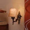 Devansh Metal Electric Wall Light in Antique Gold Colour with Beige Shade Count of 1 Light