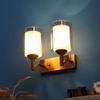 Eliante Modern Wall Lights Mild Steel & Glass Material Antique Gold & Champaign Finish