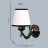 Devansh Metal Electric Wall Light in Antique Gold Colour with White & Black Shade Count of 1 Light