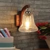 Devansh Solid Wood Electric Wall Light in Brown Colour with Transparent Shade Count of 1 Light