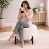 Doe Buck Premium Boucle Round Ottoman in Matte White Colour with Polished Black Legs