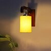 Devansh Solid Wood Electric Wall Light in Brown Colour with Yellow Shade Count of 1 Light