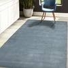 Emeril Polo Blue Solid Woven Wool 8X5 Feet Carpet