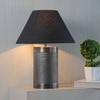 Ohagun carved metal table lamp