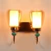 Eliante Seen Iron Wall Light With Glass In Gold Colour