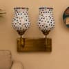 Devansh Metal Electric Wall Light in Antique Gold Colour with Multi Shade Count of 1 Light