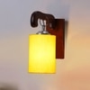 Devansh Solid Wood Electric Wall Light in Brown Colour with Yellow Shade Count of 1 Light