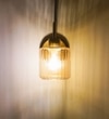 Hendrik Single Light Wall Fitting In Brass  Finish Metal With Amber Glass