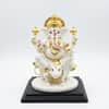 Devotional Regal Vinayaka Ganesha Statue in White Colour