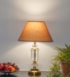 Ashurst Black & Antique Brass Finish Metal And Clear Crystal Glass Table Lamp With Beige Cotton Shade