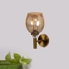 Devansh Metal Electric Wall Light in Gold Colour with Lavender Shade Count of 1 Light
