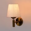 Devansh Metal Electric Wall Light in Gold Colour with White Shade Count of 1 Light
