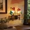 Devansh Metal Electric Wall Light in Gold Colour with Pink Shade Count of 1 Light