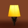 Devansh Metal Electric Wall Light in Antique Gold Colour with Yellow Shade Count of 1 Light