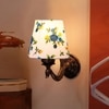 Devansh Metal Electric Wall Light in Antique Gold Colour with Multi Shade Count of 1 Light