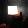 Eliante Key Wood And Iron Wall Light With Glass In Gold And Brown Colour