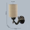 Devansh Metal Electric Wall Light in Antique Gold Colour with Beige Shade Count of 1 Light