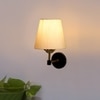 Devansh Metal Electric Wall Light in Black Colour with off-white Shade Count of 1 Light