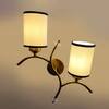 Devansh Metal Electric Wall Light in Gold Colour with White & Black Shade Count of 2 Lights