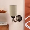 Devansh Metal Electric Wall Light in Antique Gold Colour with Beige Shade Count of 1 Light