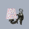 Devansh Metal Electric Wall Light in Antique Gold Colour with Multi Shade Count of 1 Light
