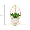 Green Leafy Artificial Plant With White And Gold Ceramic Pot