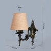 Devansh Metal Electric Wall Light in Antique Gold Colour with Beige Shade Count of 1 Light