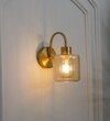 Hendrik Single Light Wall Fitting In Brass  Finish Metal With Amber Glass