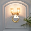 Pegasus 2 Light Wall Fitting In Brass Finish With Amber Glass Shade