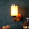 Eliante Alif Iron Wall Light With Glass In Gold Colour