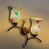 Devansh Metal Electric Wall Light in Gold Colour with Multi Shade Count of 2 Lights