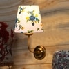 Devansh Metal Electric Wall Light in Gold Colour with Multi Shade Count of 1 Light