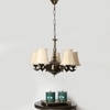 Devansh Gold Wall Mounted Lamp With Off-White Cotton Shade