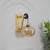 Ambre Single Light Wall Light In Amber & Brass Finish