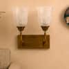 Devansh Metal Electric Wall Light in Antique Gold Colour with Beige Shade Count of 1 Light