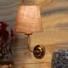 Devansh Metal Electric Wall Light in Gold Colour with Beige Shade Count of 1 Light