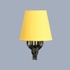 Devansh Metal Electric Wall Light in Antique Gold Colour with Yellow Shade Count of 1 Light