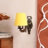 Devansh Metal Electric Wall Light in Antique Gold Colour with Yellow Shade Count of 1 Light