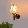 Devansh Metal Electric Wall Light in Gold Colour with Multi Shade Count of 1 Light