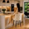 Doe Buck Upholstered Counter Height Bar Stool in Beige Colour with Gold Accents