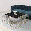 Benton Nesting Black Glass Coffee Table Set With 4 Stools In Gold Finish