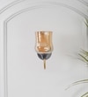 Florian Single Light Wall Fitting In Black And Brass Finish Metal With Amber Glass