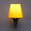 Devansh Metal Electric Wall Light in Antique Gold Colour with Yellow Shade Count of 1 Light