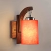Devansh Solid Wood Electric Wall Light in Brown Colour with Orange Shade Count of 1 Light
