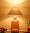 Paola  Amber Glass And Wood Table Lamp With Beige Cotton Shade